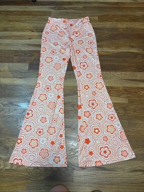 SHEIN orange floral pull on bell bottom pants